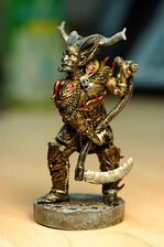 Arch Devil collectible sold with some copies of Heroes of Might and Magic V for the Chinese market.